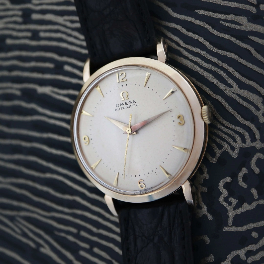 Omega 9k Gold Dennison, 1958