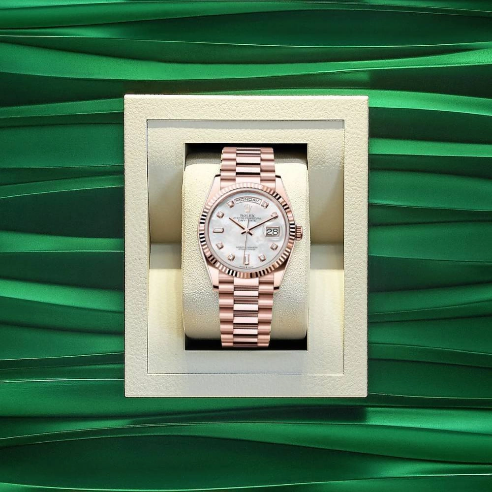 Rolex Day Date 36mm - Ref: 128235-0029 - White Mother of Pearl Diamond Dial & Fluted Bezel, 18K Rose Gold President Bracelet Watch