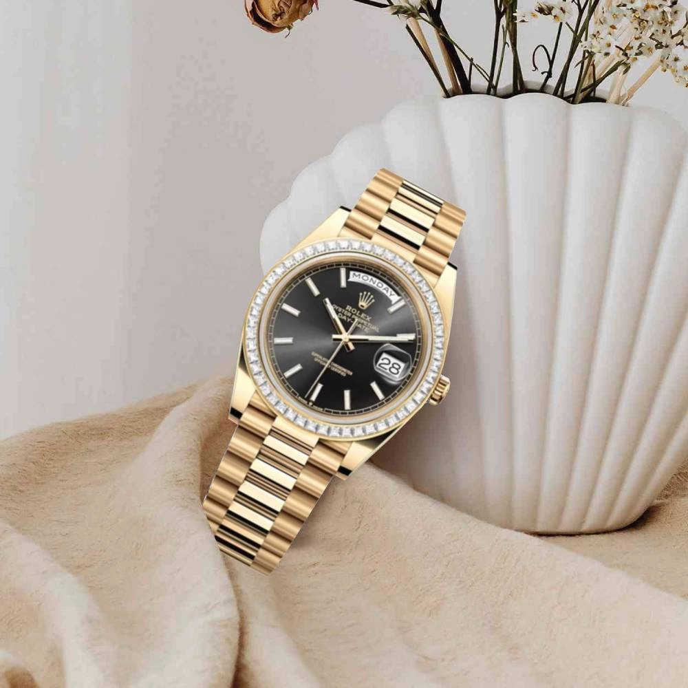Rolex Day Date 40mm - Ref: 228398TBR - Black Stick Dial & Diamond Bezel, 18K Yellow Gold President Bracelet Men's Watch