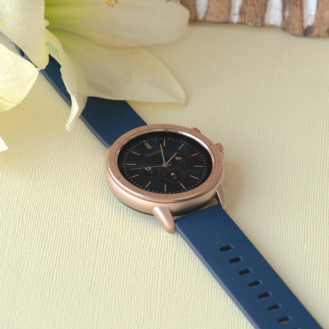 Rose gold coloured OOZOO smartwatch with dark blue rubber strap - Q00326