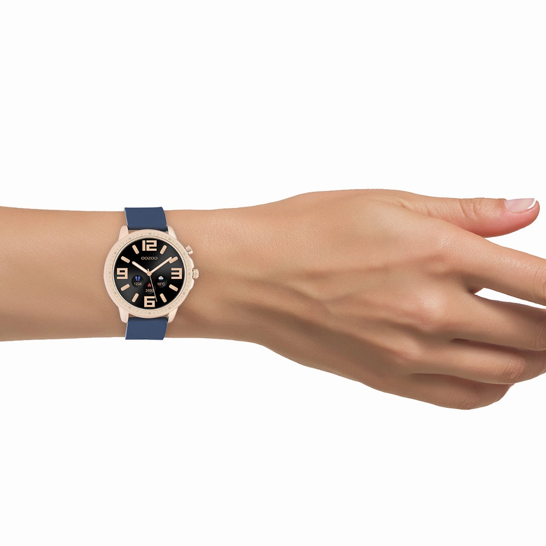 Rose gold coloured OOZOO smartwatch with dark blue rubber strap - Q00326